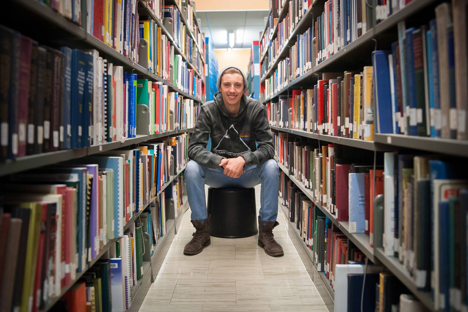 Caleb MacKinnon in the library