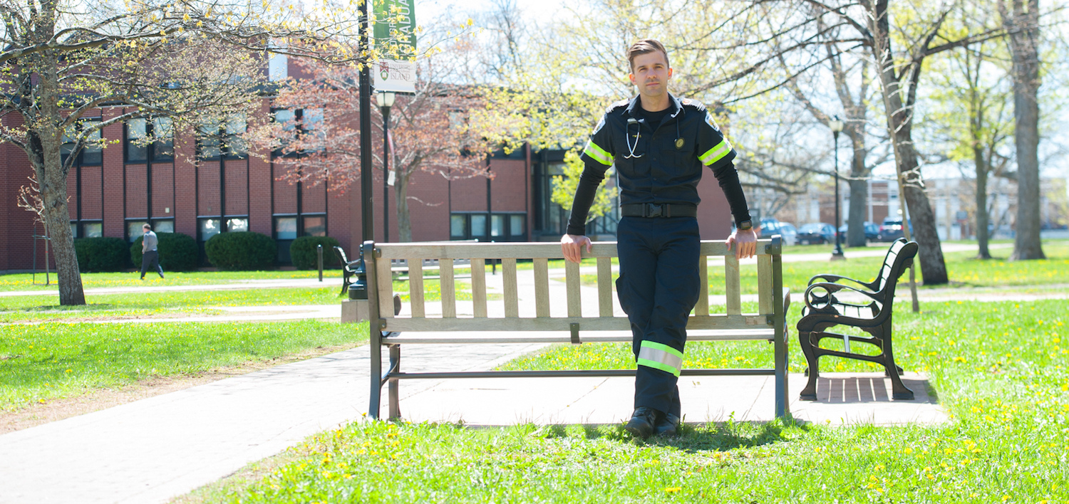 male paramedic standing in the BCA quad