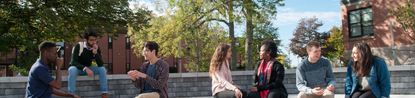 students sitting in the outdoor amphitheatre 